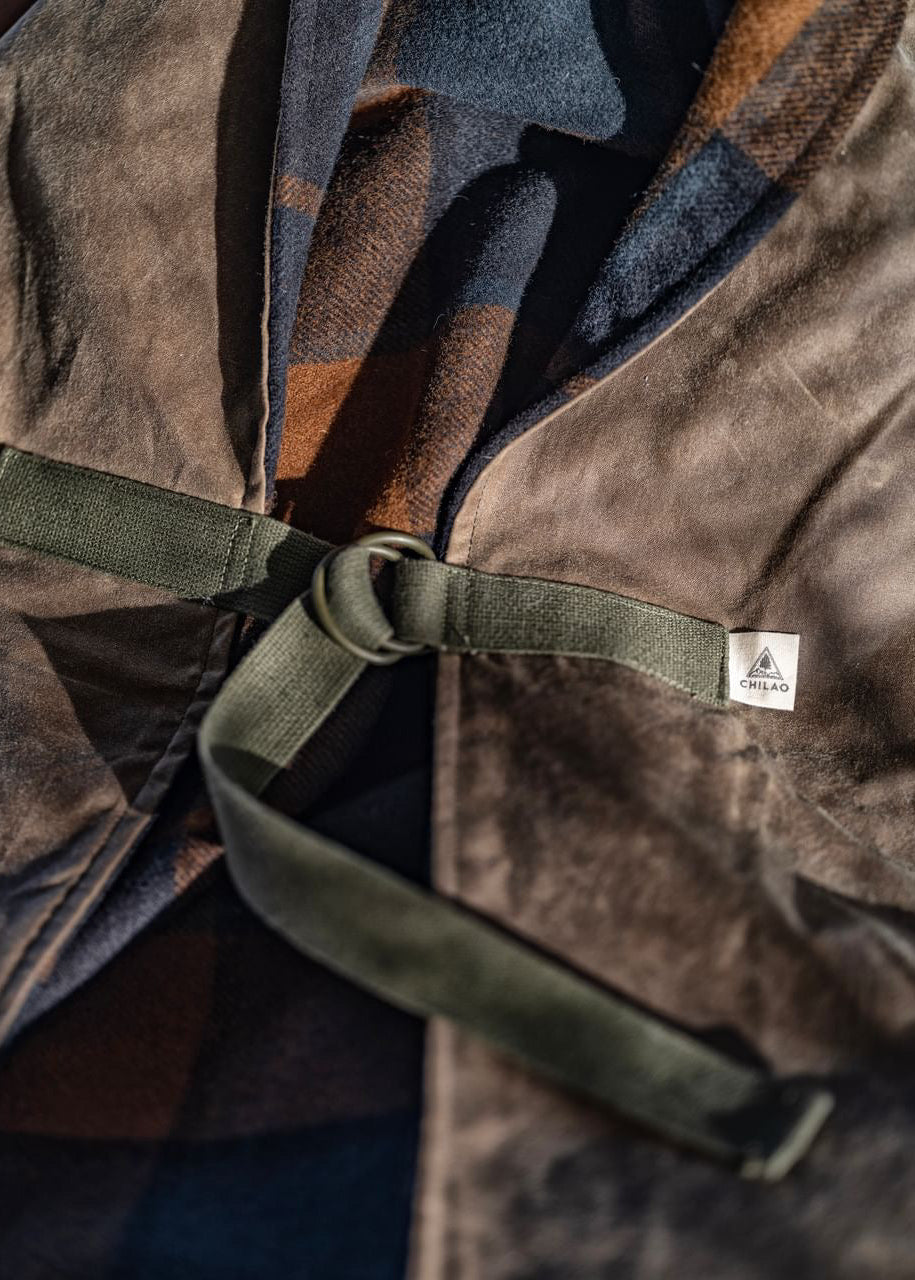 Bandido Poncho vintage military straps and 1940s hardware detail