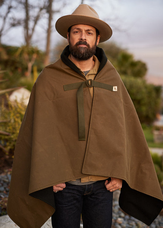 Person wearing Bandido Poncho waxed canvas and wool