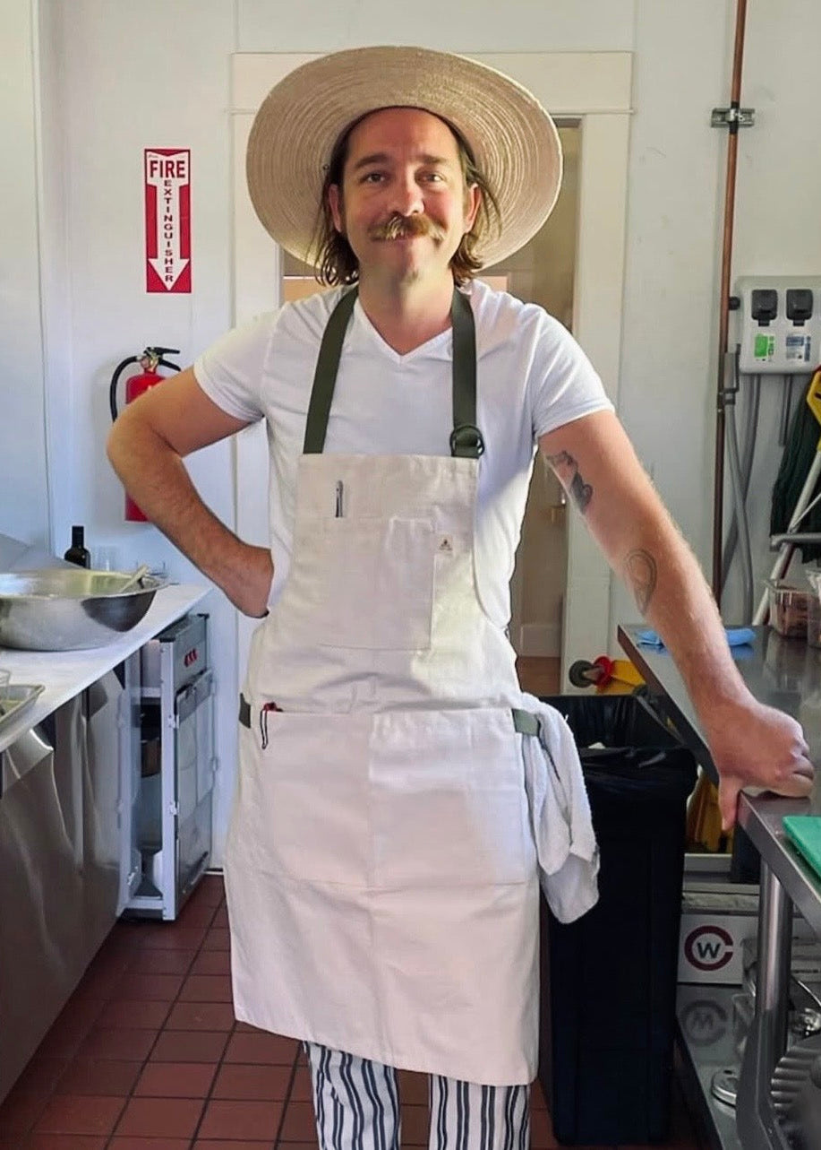 Buckhorn Apron in Natural Canvas with adjustable D-ring straps and multiple pockets