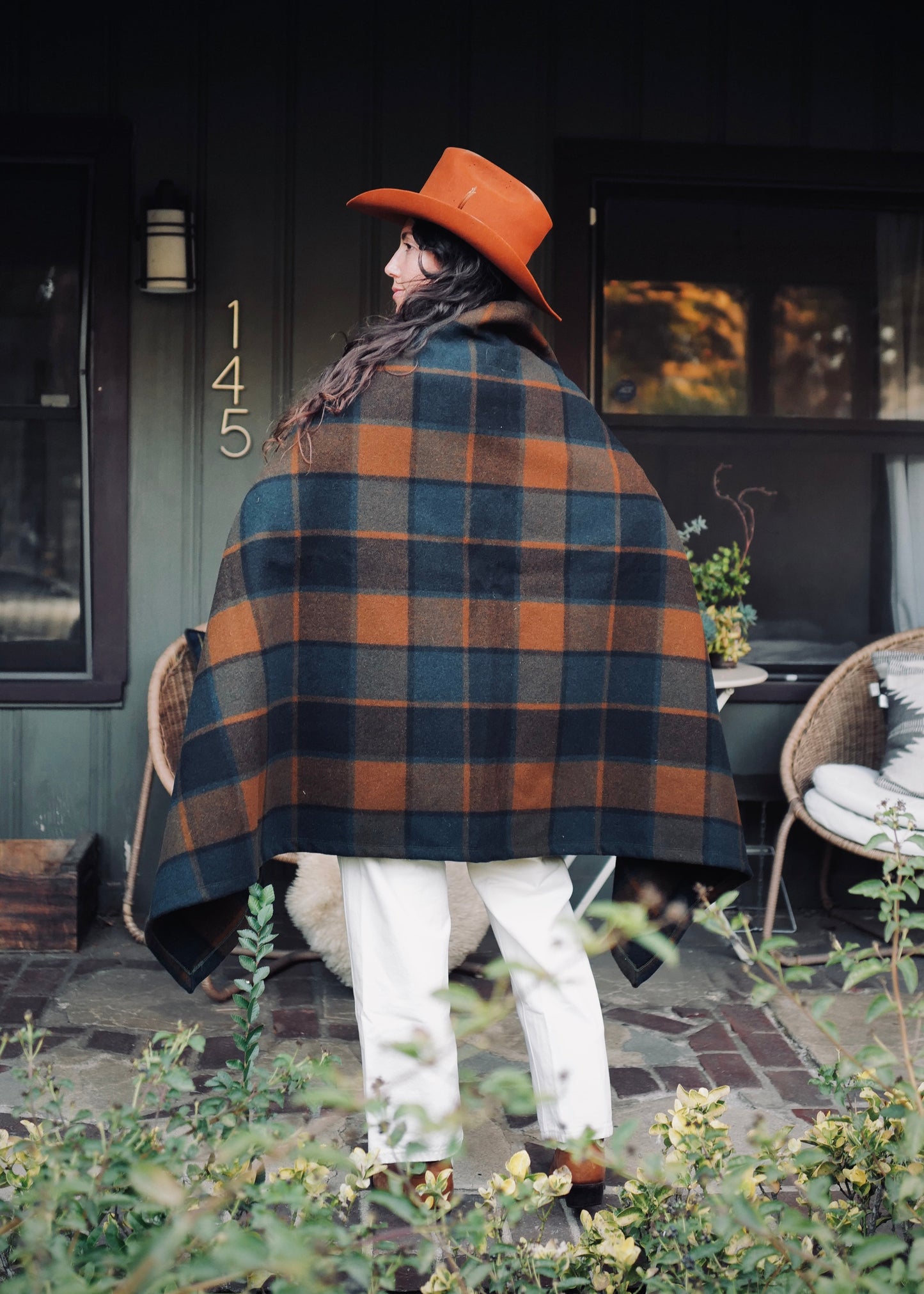 Back view of Pine Mountain Poncho showing plaid pattern