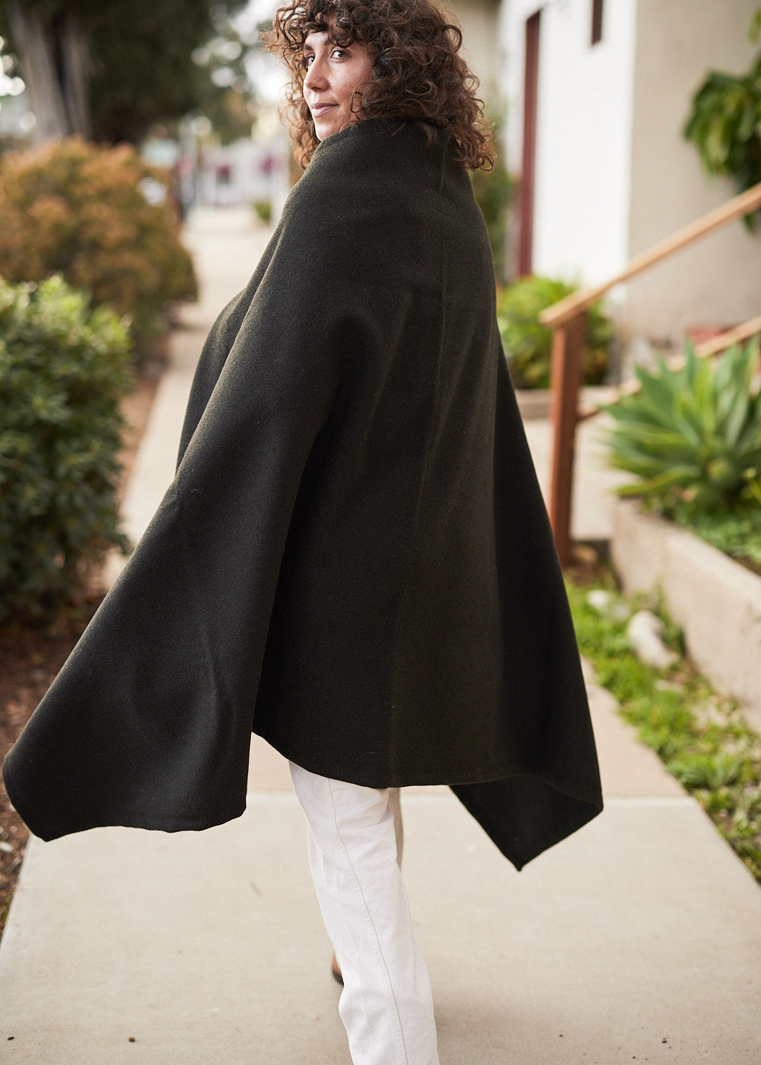 Back view of Pine Mountain Poncho in olive wool