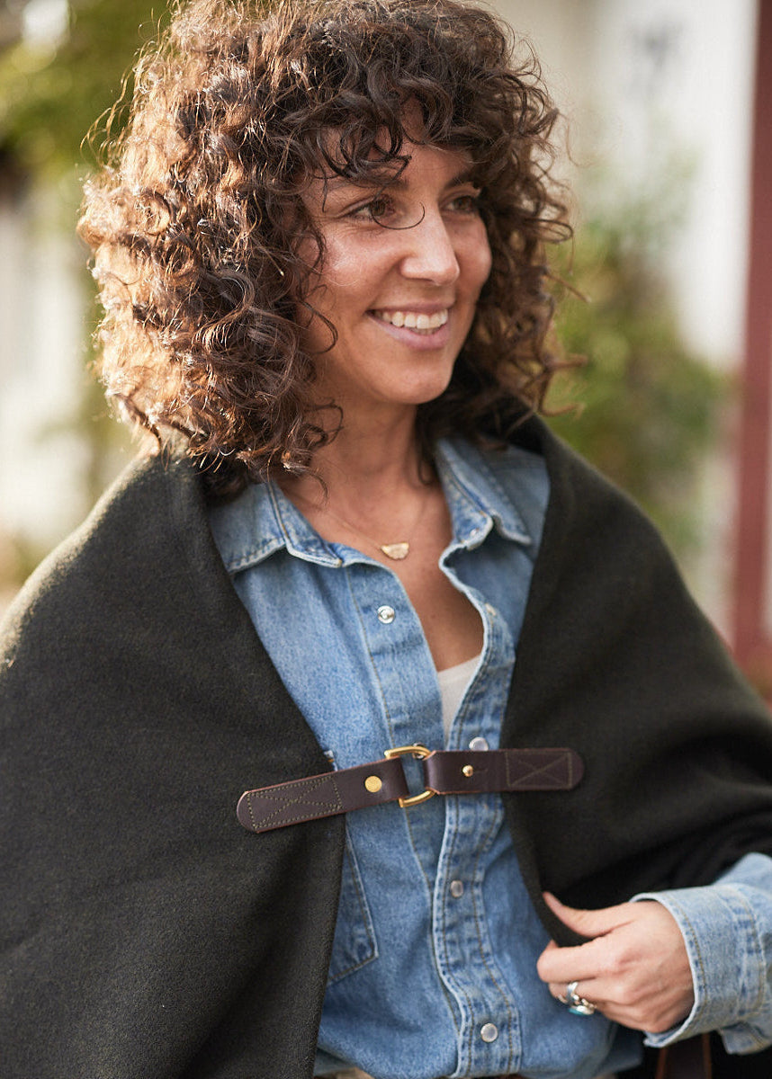 Pine Mountain Poncho leather clasp and brass hardware detail