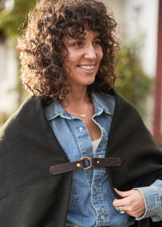 Pine Mountain Poncho leather clasp and brass hardware detail