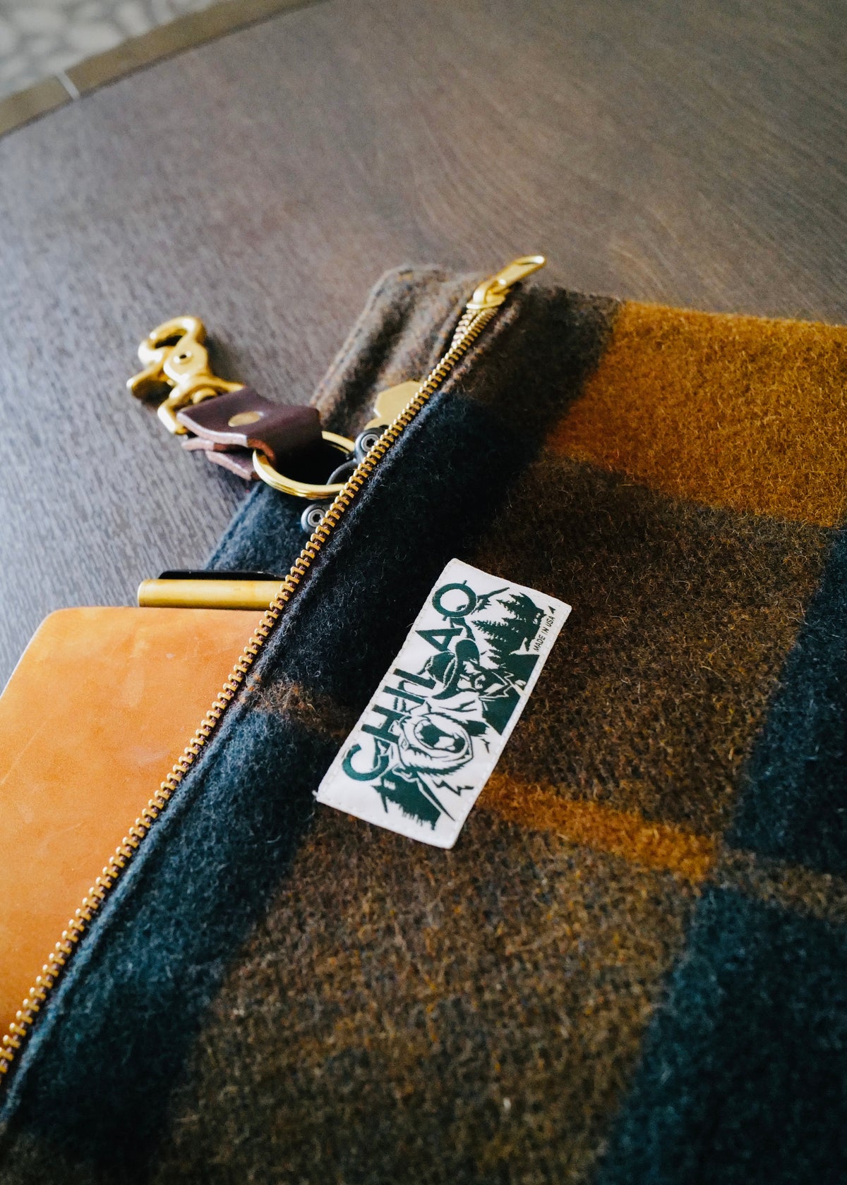 The Wooly Catch-all in wool fabric with brass zipper