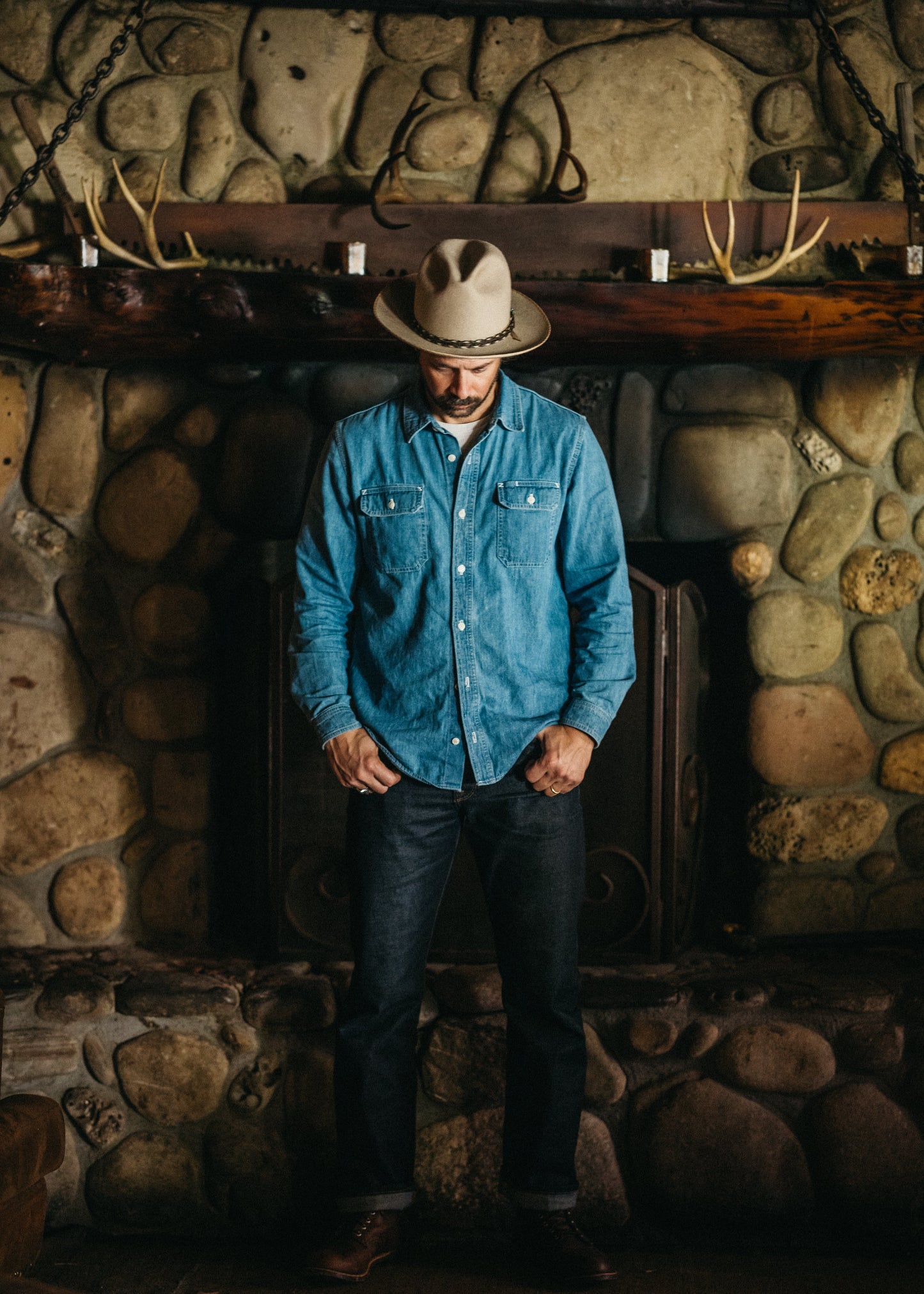 Lone Pine light wash denim shirt - front view showing corozo button detail