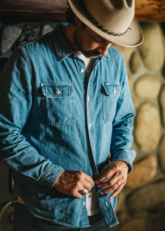 Lone Pine Shirt in light wash Japanese denim with natural corozo buttons, reinforced elbows, and a pen pocket slot 