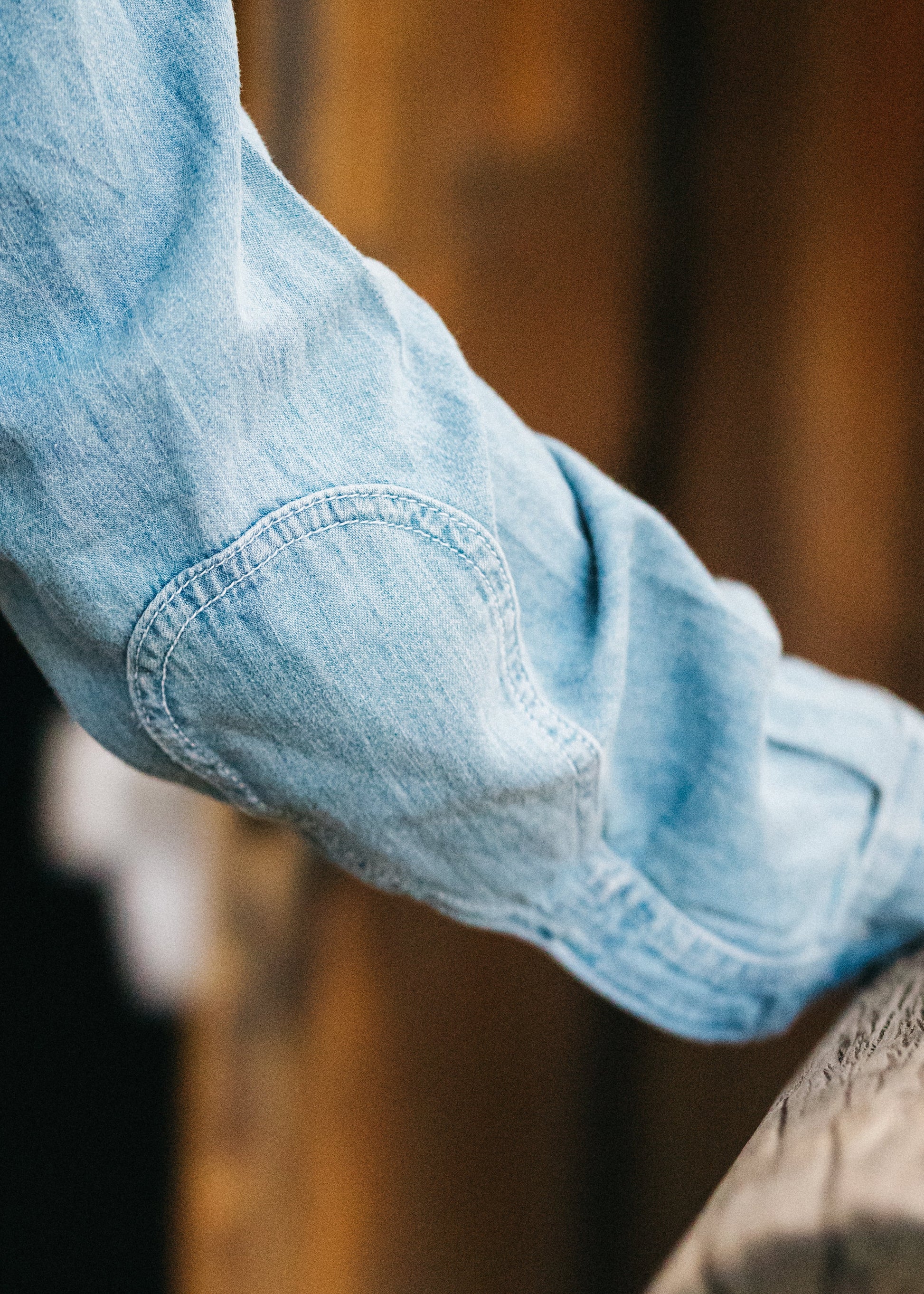 Lone Pine denim shirt - side view showing reinforced elbow detail