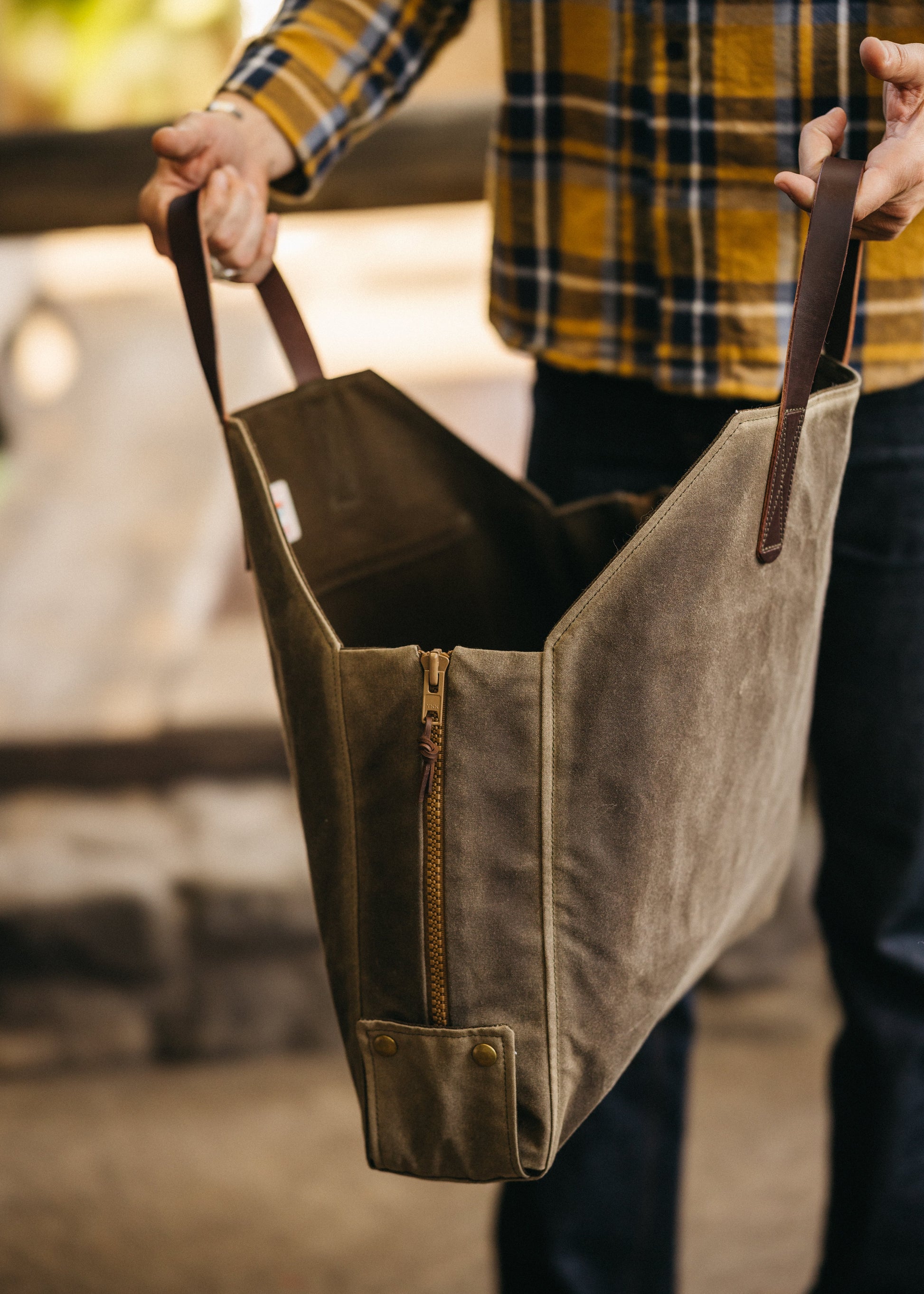 Interior view of Newcomb tote showing pine green duck canvas lining
