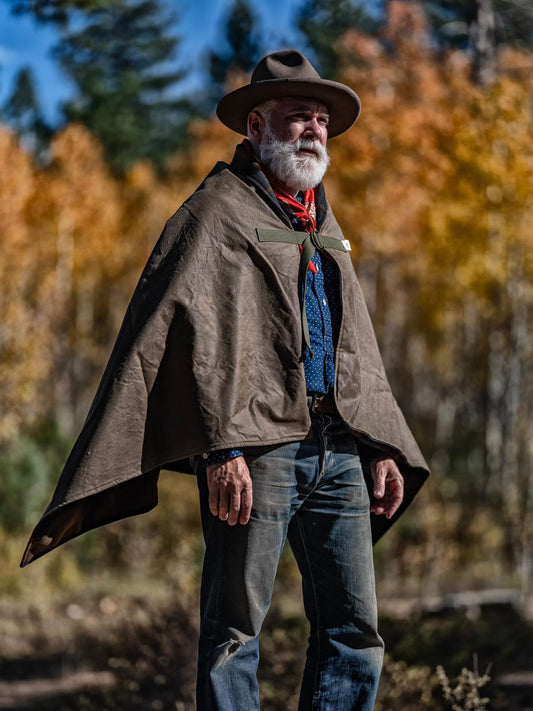 Bandido Poncho in waxed canvas with Italian wool liner worn by Cory Piehowicz