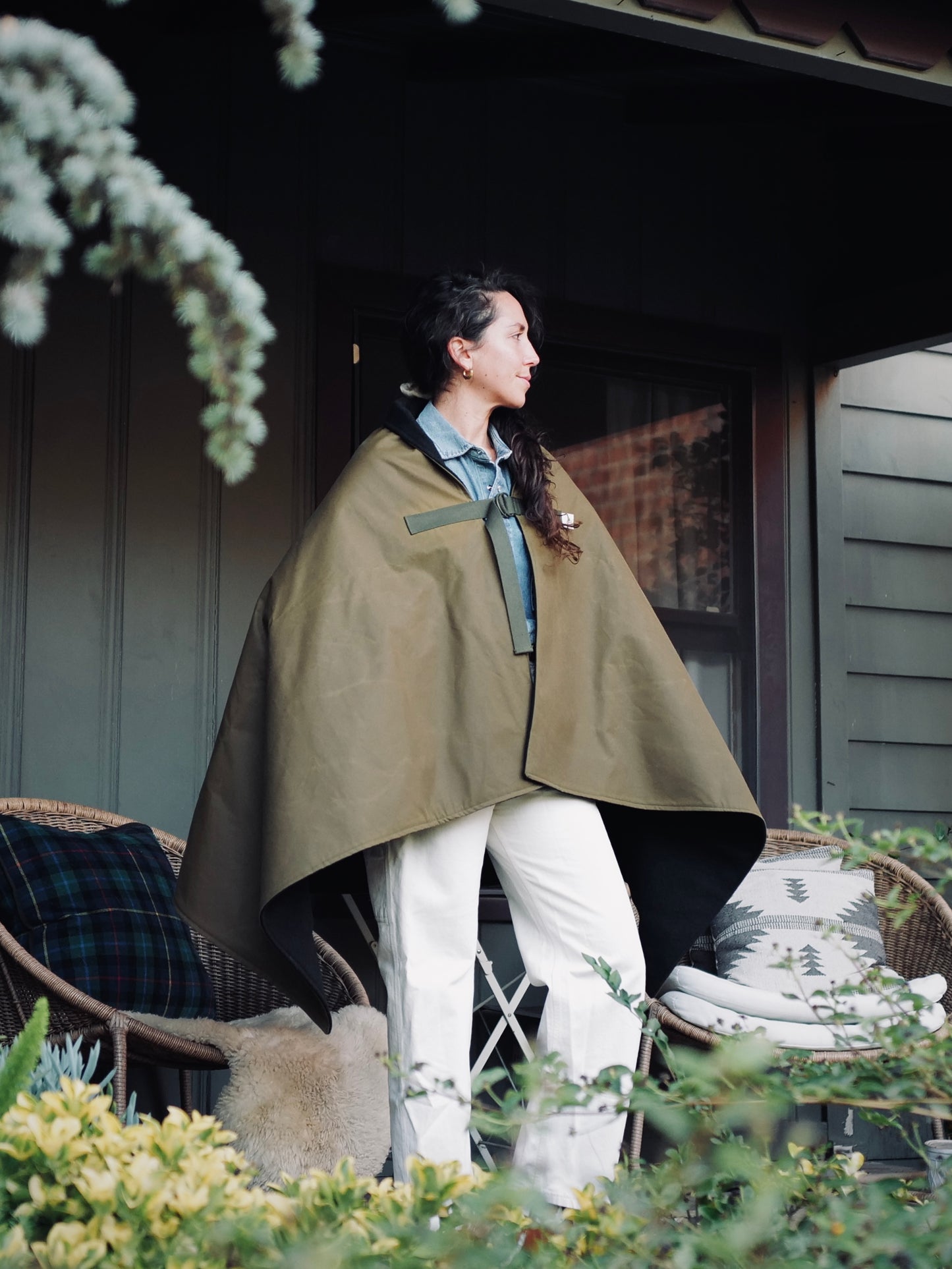 Person wearing Bandido Poncho waxed canvas and wool