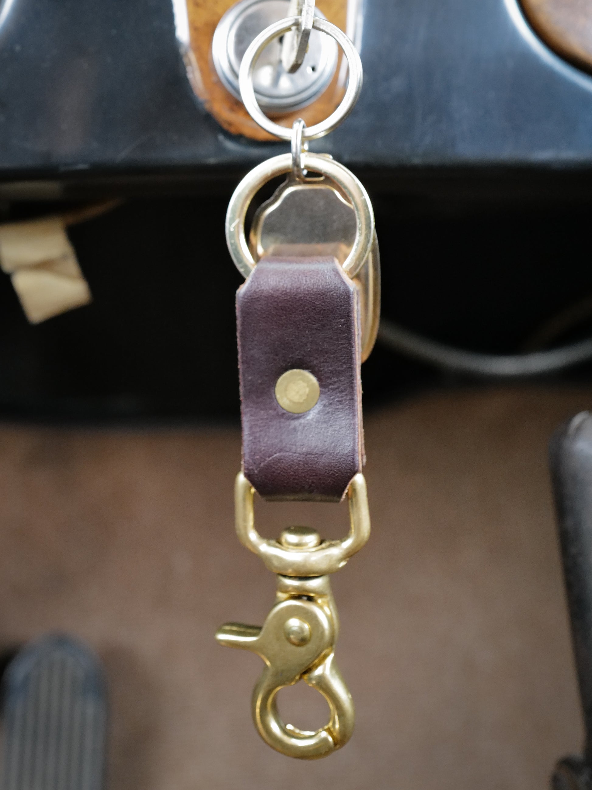 Brass and leather keychain with solid brass ring