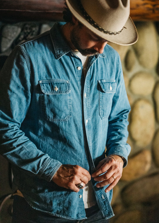 Lone Pine Shirt in light wash Japanese denim with natural corozo buttons, reinforced elbows, and a pen pocket slot 
