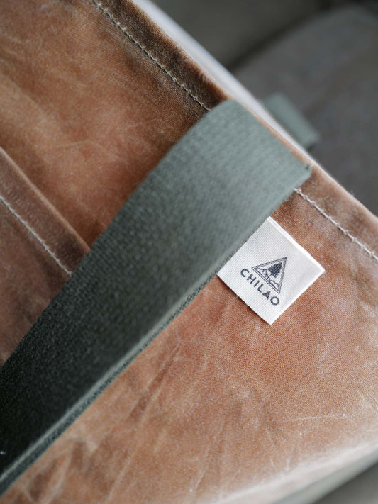 Close-up of waxed canvas fabric on The Gamer bag