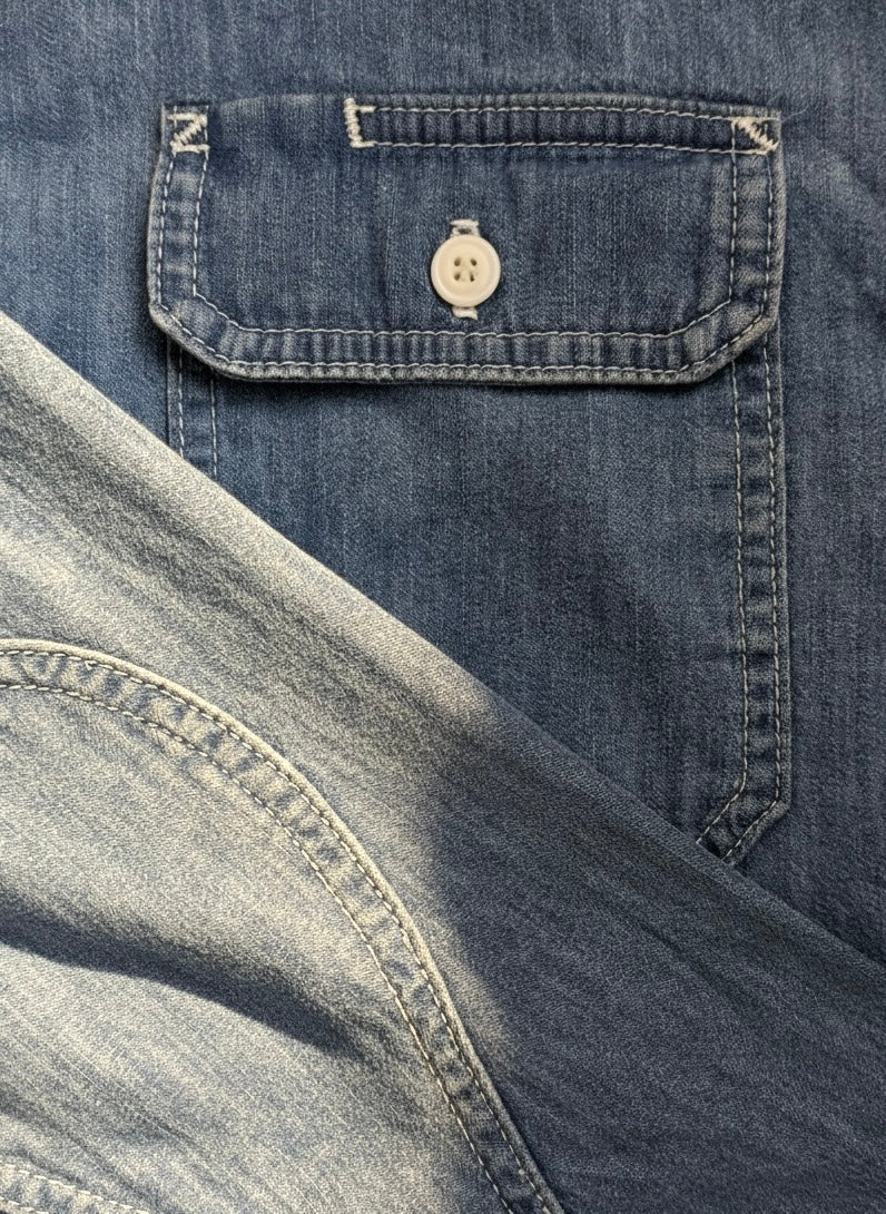 Lone Pine denim shirt button and pocket detail