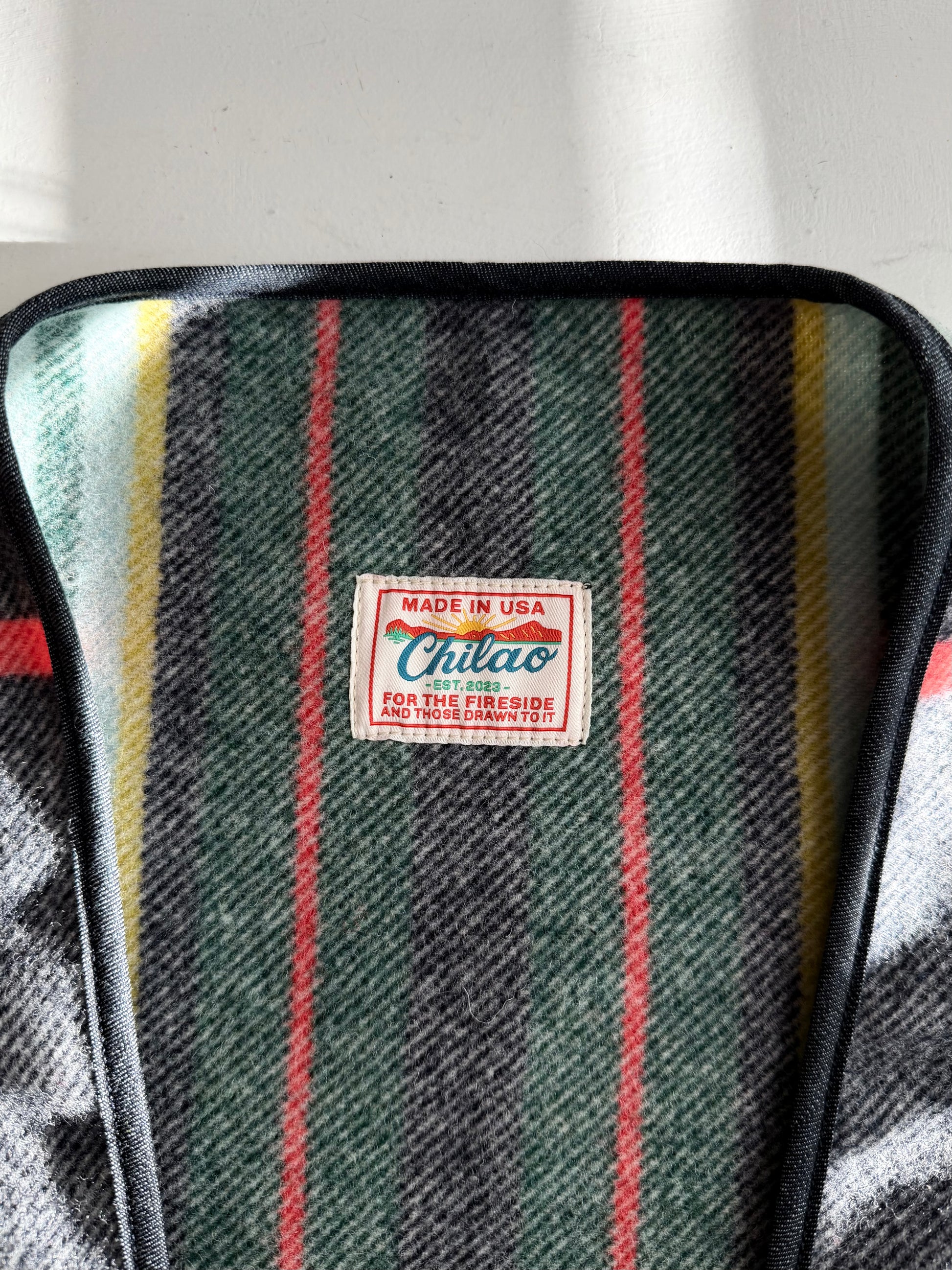 Pine Mountain Poncho Grey Striped Wool close up with Made in USA tag