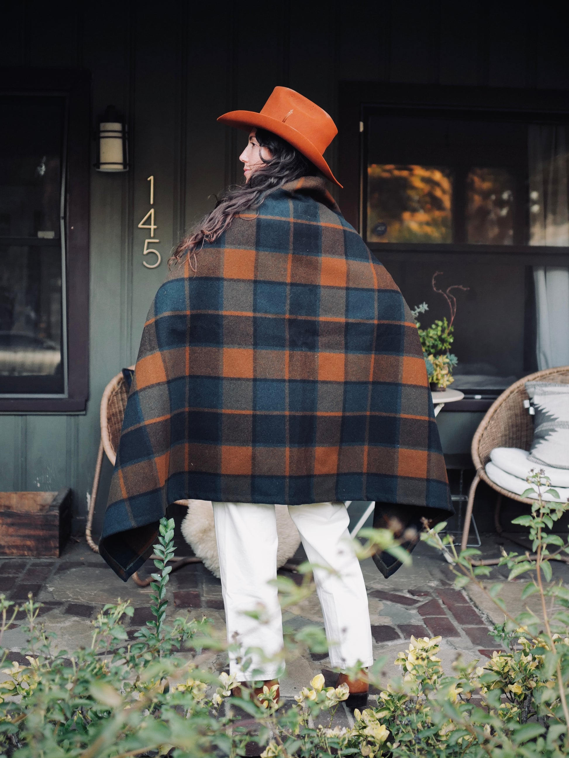 Back view of Pine Mountain Poncho showing plaid pattern