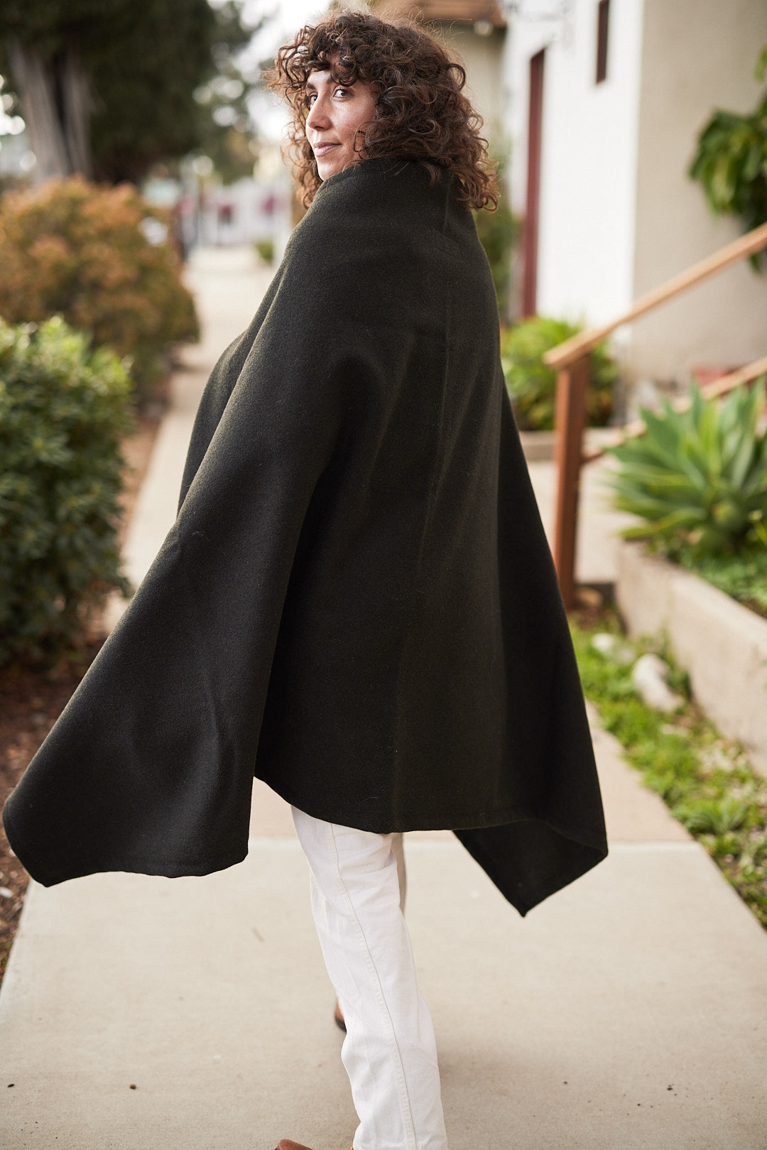 Back view of Pine Mountain Poncho in olive wool